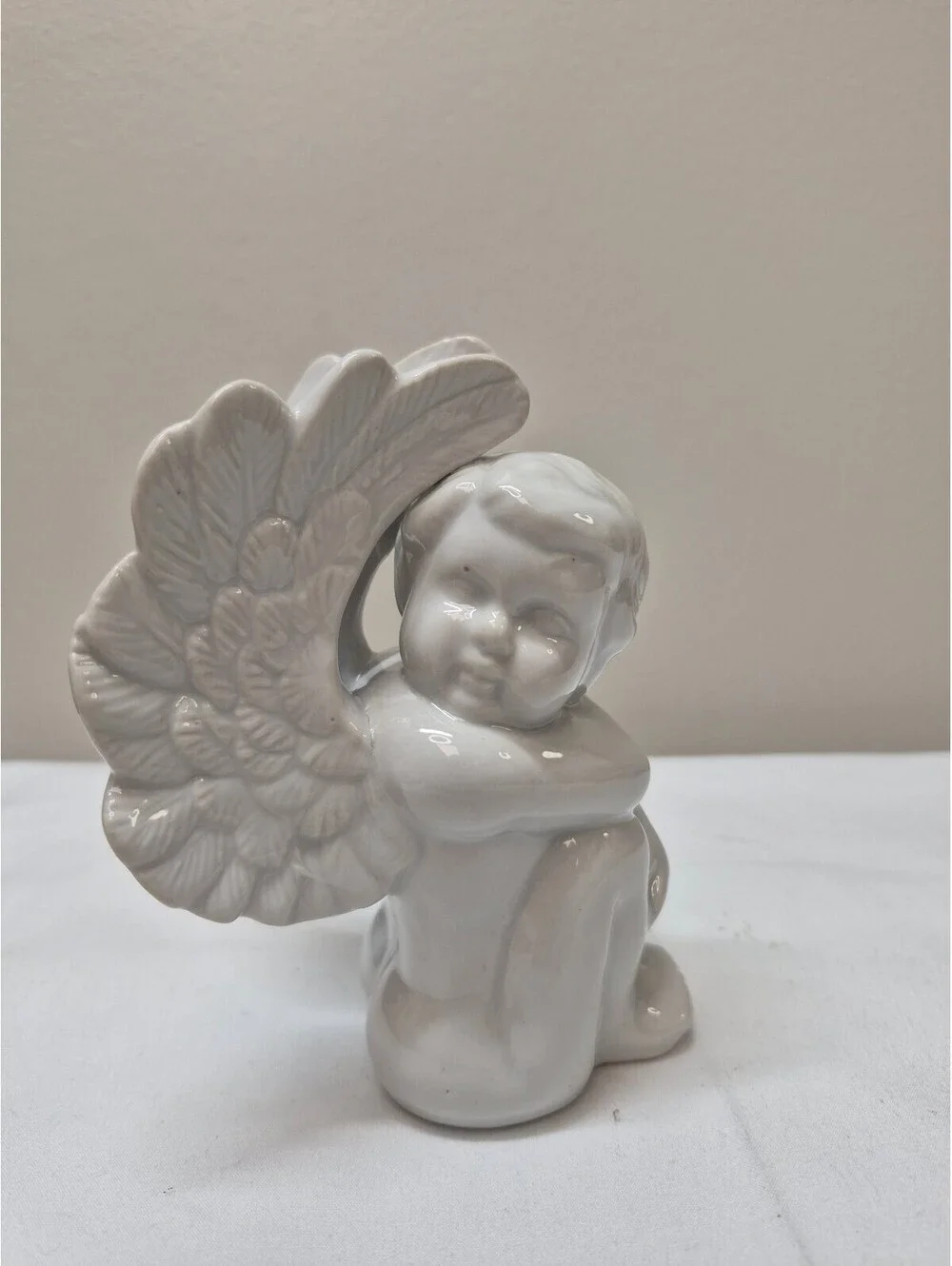 White Ceramic Angel Figurine with Detailed Wings J11
